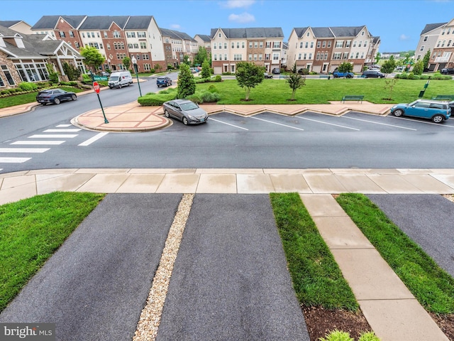 5920 Forum Sq ., Unit Frederick, MD 21703 - uncovered parking lot with a residential view