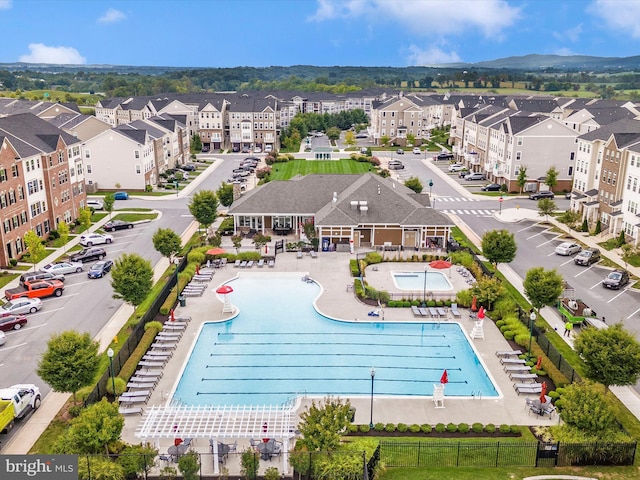 5920 Forum Sq ., Unit Frederick, MD 21703 - aerial perspective of suburban area with a pool area