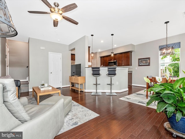 5920 Forum Sq ., Unit Frederick, MD 21703 - living area with a ceiling fan, a chandelier, dark wood finished floors, and recessed lighting