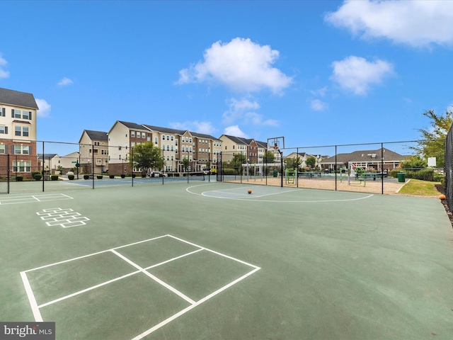 5920 Forum Sq ., Unit Frederick, MD 21703 - view of home's community with community basketball court, fence, and a residential view