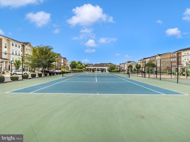 5920 Forum Sq ., Unit Frederick, MD 21703 - view of tennis court featuring fence, a residential view, and community basketball court