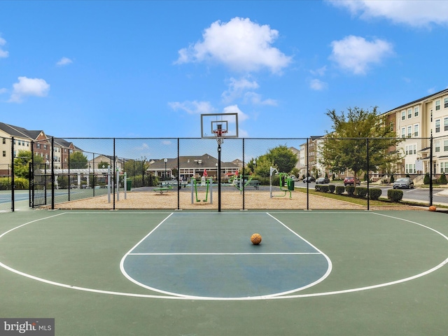 5920 Forum Sq ., Unit Frederick, MD 21703 - view of sport court with community basketball court, fence, and a residential view