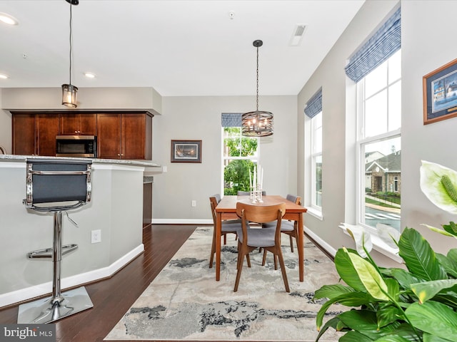 5920 Forum Sq ., Unit Frederick, MD 21703 - dining area featuring a chandelier, dark wood-style flooring, baseboards, and recessed lighting
