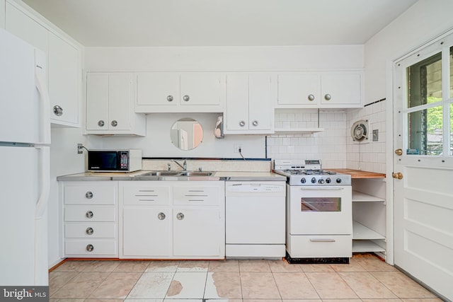 12102 Hunters Ln, Rockville, MD 20852 - kitchen featuring white appliances, a sink, light countertops, and white cabinets