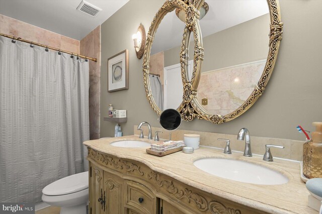 737 Saint Michaels Dr, Bowie, MD 20721 - full bath with toilet, double vanity, and a shower with shower curtain