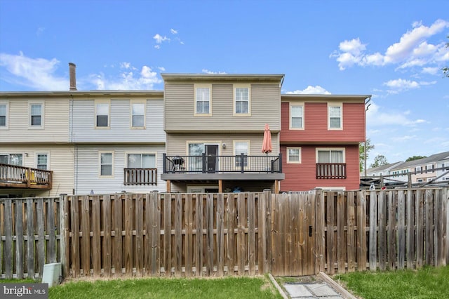 737 Saint Michaels Dr, Bowie, MD 20721 - rear view of house with a fenced backyard