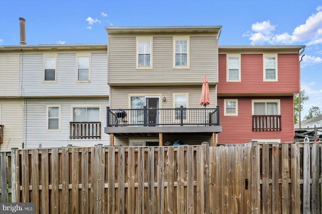 737 Saint Michaels Dr, Bowie, MD 20721 - back of house with fence and a balcony