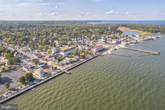 aerial view of property's location featuring a nearby body of water