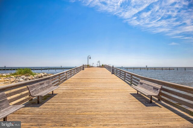 dock area featuring a water view