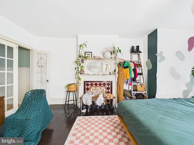 4714 Woodland Ave, Philadelphia, PA 19143 - bedroom with hardwood / wood-style flooring and baseboards