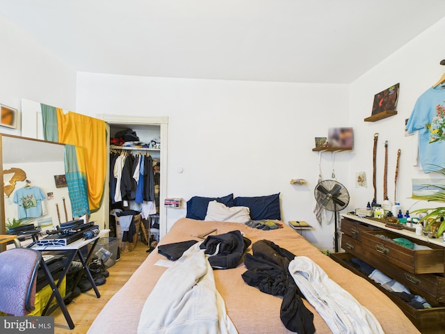4714 Woodland Ave, Philadelphia, PA 19143 - bedroom featuring light wood-style flooring and a closet