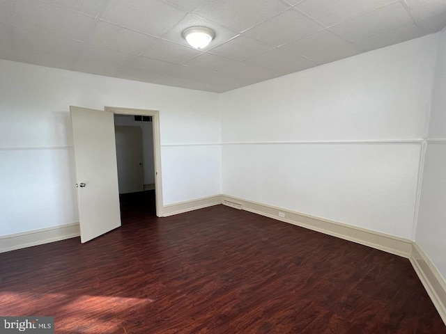 4714 Woodland Ave, Philadelphia, PA 19143 - unfurnished room with wood finished floors and baseboards