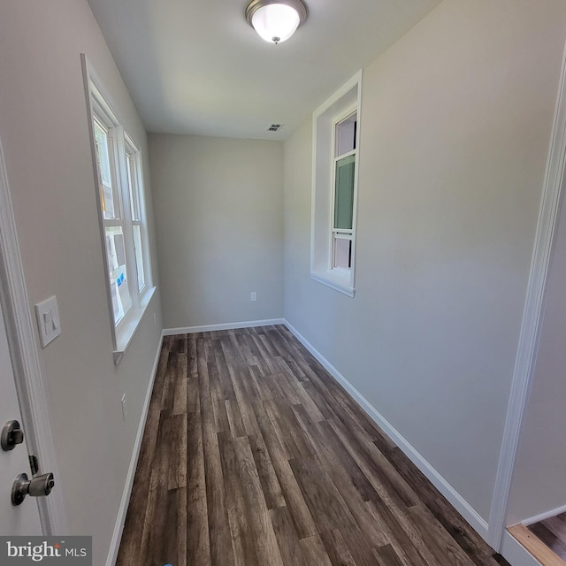 4105 38th St, Brentwood, MD 20722 - empty room with dark wood finished floors and baseboards