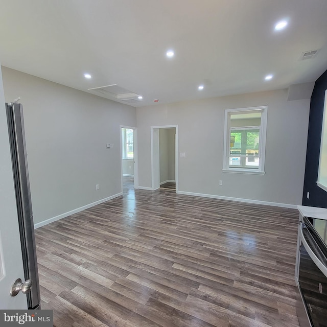 4105 38th St, Brentwood, MD 20722 - unfurnished living room featuring dark wood finished floors, recessed lighting, and baseboards