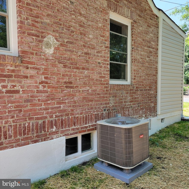 4105 38th St, Brentwood, MD 20722 - exterior view of central air condition unit and brick siding