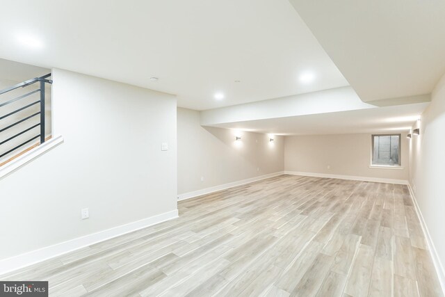 3233 Mercer St, Philadelphia, PA 19134 - below grade area featuring light wood-type flooring, baseboards, and stairs