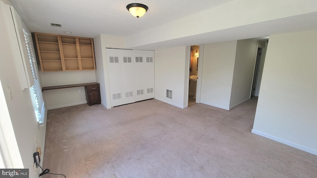 19503 Fetlock Dr, Germantown, MD 20874 - unfurnished bedroom with light carpet, baseboards, and a closet