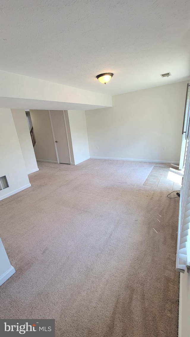 19503 Fetlock Dr, Germantown, MD 20874 - unfurnished room featuring carpet flooring, a textured ceiling, and baseboards