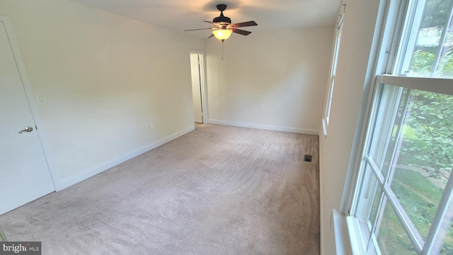 19503 Fetlock Dr, Germantown, MD 20874 - carpeted empty room with a ceiling fan and baseboards