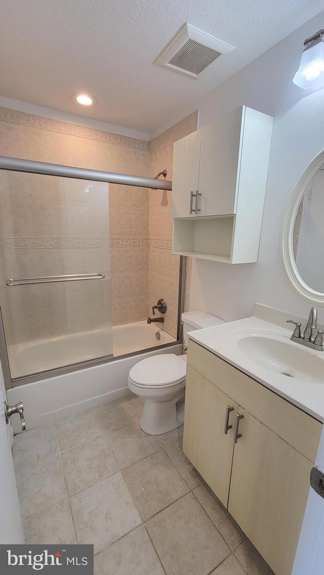 19503 Fetlock Dr, Germantown, MD 20874 - full bathroom with combined bath / shower with glass door, toilet, vanity, a textured ceiling, and recessed lighting