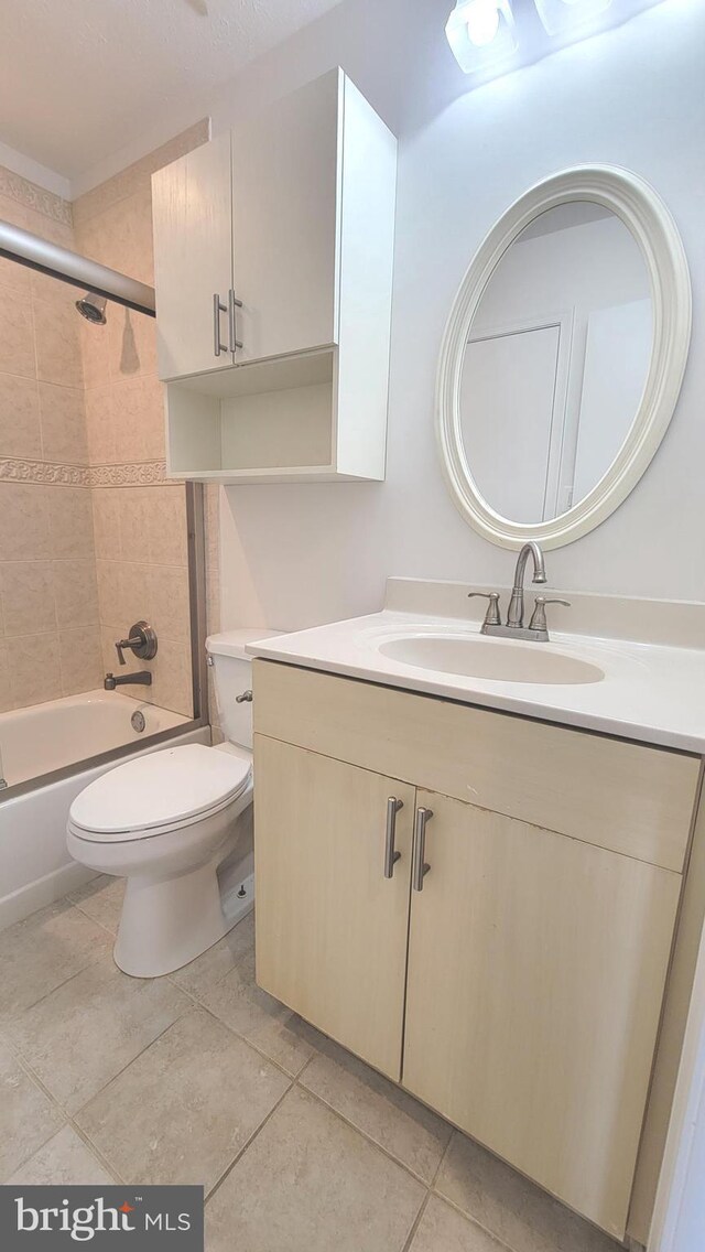 19503 Fetlock Dr, Germantown, MD 20874 - full bath featuring tile patterned floors, toilet, vanity, and shower / bath combination