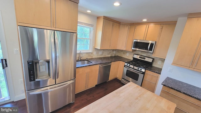 19503 Fetlock Dr, Germantown, MD 20874 - kitchen featuring stainless steel appliances, light brown cabinets, dark wood-type flooring, and recessed lighting