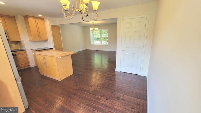19503 Fetlock Dr, Germantown, MD 20874 - kitchen with a chandelier, wood counters, dark wood-style flooring, light brown cabinetry, and recessed lighting