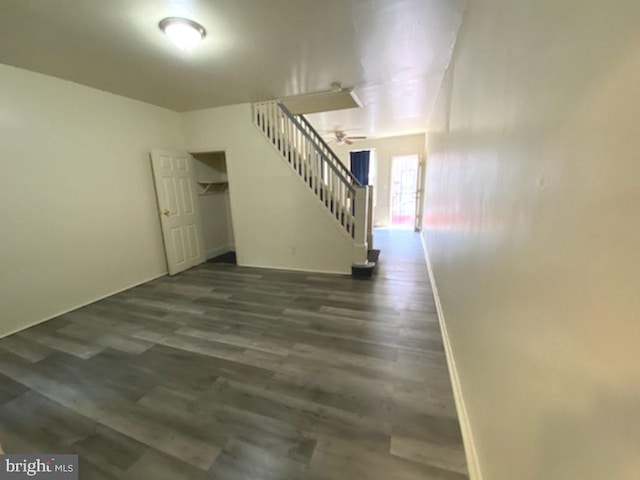 433 E Auburn St, Philadelphia, PA 19134 - unfurnished living room with stairs, wood finished floors, ceiling fan, and baseboards