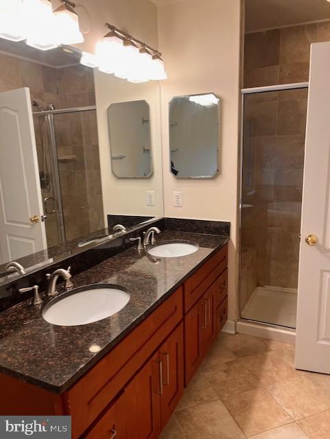 1910 Scaffold Way, Odenton, MD 21113 - full bath with a stall shower, tile patterned flooring, and double vanity