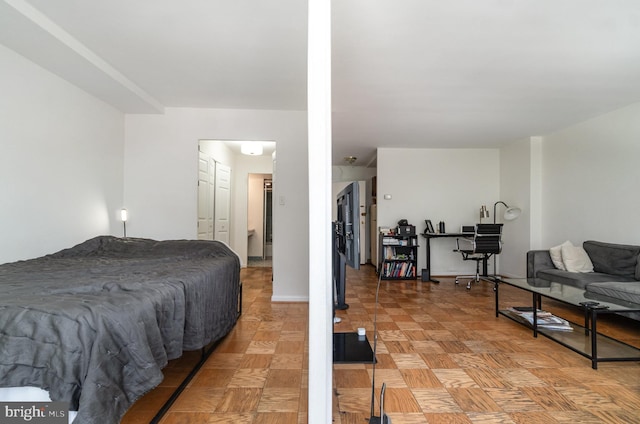 922 24th St NW Unit 313, Washington, DC 20037 - bedroom with baseboards