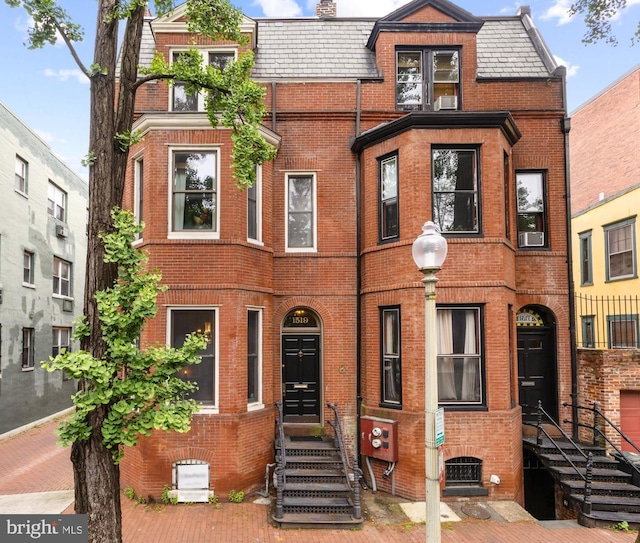 1519 Kingman Pl NW, Washington, DC 20005 - view of front of house with brick siding, a high end roof, and mansard roof