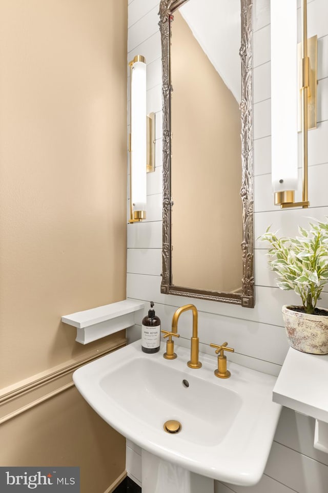 1519 Kingman Pl NW, Washington, DC 20005 - bathroom featuring a sink and vaulted ceiling