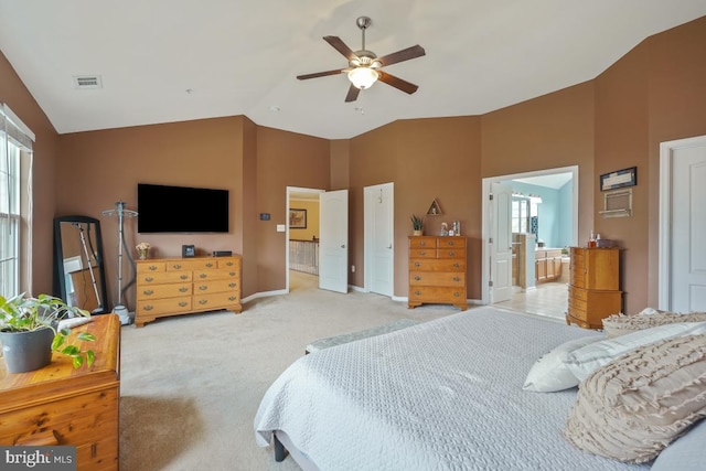 6218 Alan Linton Blvd W, Frederick, MD 21703 - bedroom with light colored carpet, high vaulted ceiling, baseboards, connected bathroom, and a ceiling fan