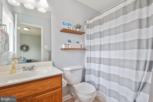 6218 Alan Linton Blvd W, Frederick, MD 21703 - full bathroom with toilet, vanity, and curtained shower
