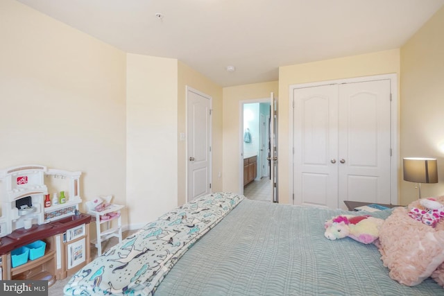 6218 Alan Linton Blvd W, Frederick, MD 21703 - bedroom featuring a closet, baseboards, and ensuite bathroom