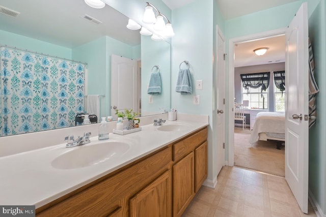 6218 Alan Linton Blvd W, Frederick, MD 21703 - bathroom featuring double vanity, ensuite bath, and tile patterned floors