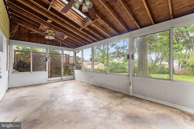 unfurnished sunroom featuring ceiling fan and lofted ceiling