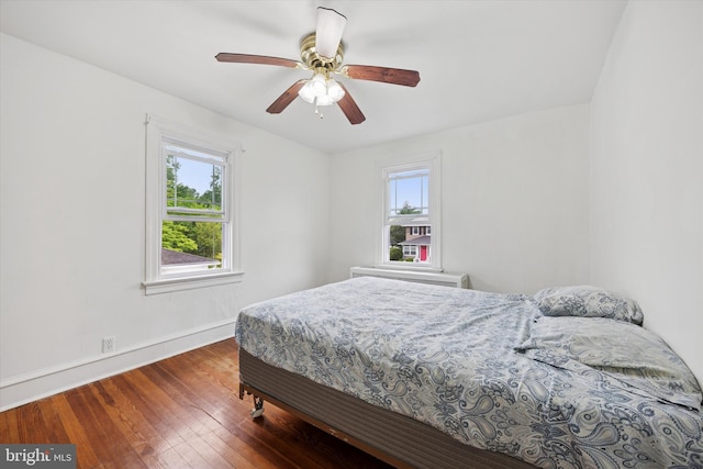 237 Roland Rd, Brookhaven, PA 19015 - bedroom with baseboards, wood finished floors, and a ceiling fan