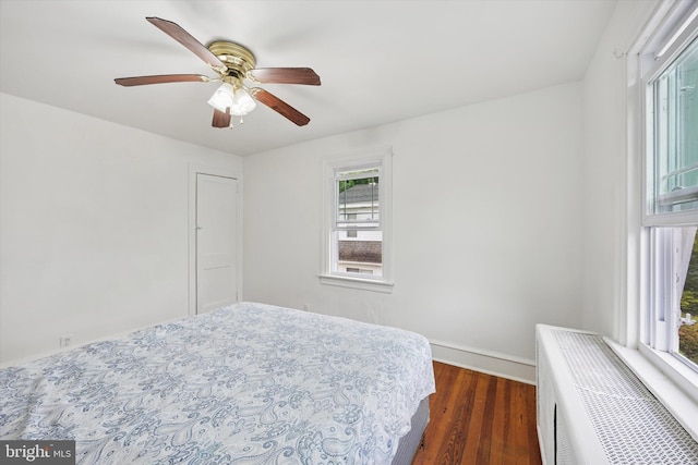 237 Roland Rd, Brookhaven, PA 19015 - bedroom with dark wood-type flooring, baseboards, and a ceiling fan