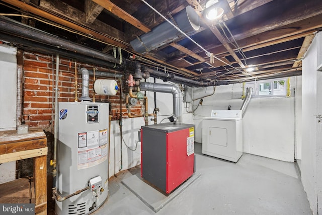 237 Roland Rd, Brookhaven, PA 19015 - below grade area featuring water heater, washer and dryer, and a heating unit