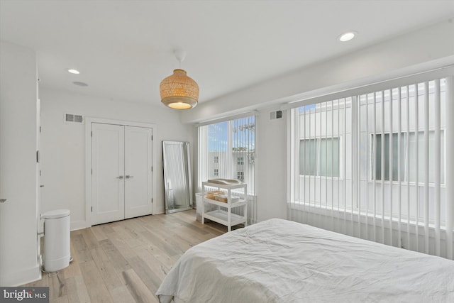 1325 N 17th St Unit A, Philadelphia, PA 19121 - bedroom with hardwood / wood-style floors, recessed lighting, baseboards, and a closet