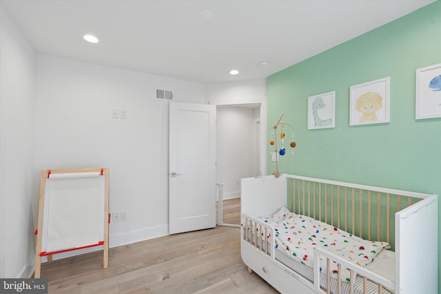 1325 N 17th St Unit A, Philadelphia, PA 19121 - bedroom with wood finished floors, recessed lighting, and baseboards
