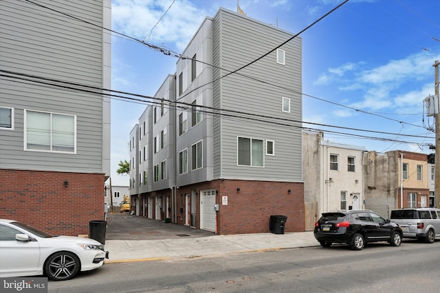 1325 N 17th St Unit A, Philadelphia, PA 19121 - view of property featuring a garage