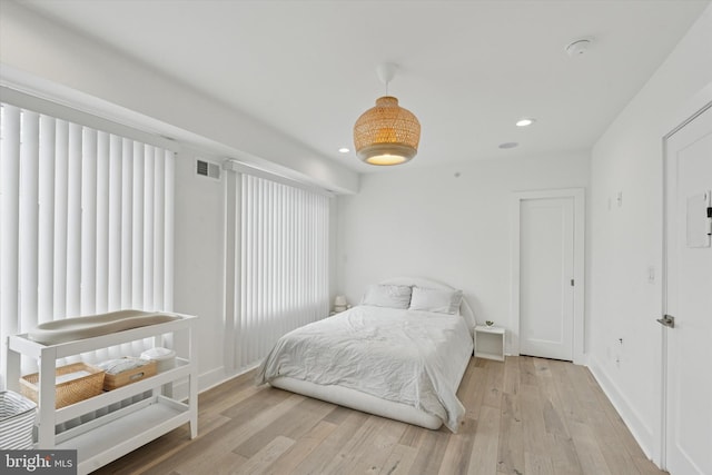 1325 N 17th St Unit A, Philadelphia, PA 19121 - bedroom with wood finished floors, recessed lighting, and baseboards
