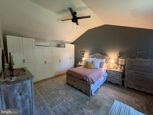 bedroom featuring vaulted ceiling, a wall mounted air conditioner, and ceiling fan
