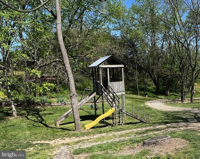 view of jungle gym with a yard