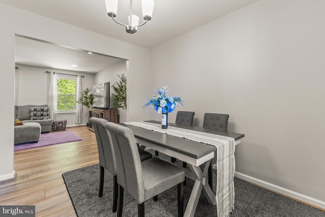 3607 Stonesboro Rd, Fort Washington, MD 20744 - dining area featuring light wood-style flooring, baseboards, and a chandelier