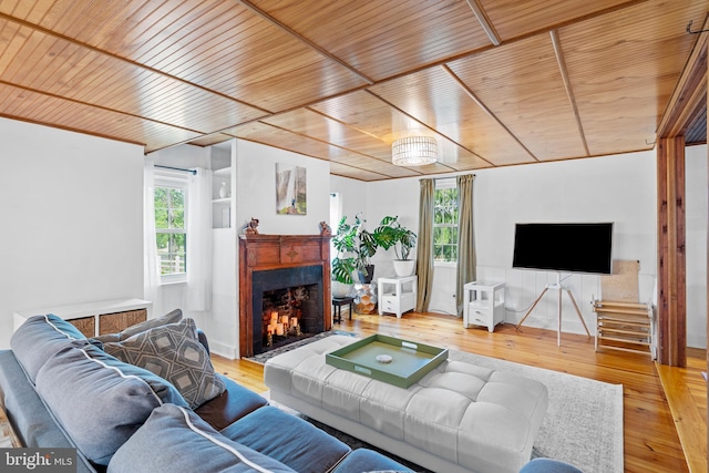 522 Creek Rd, Moorestown, NJ 08057 - living area with wooden ceiling, a fireplace with flush hearth, and wood-type flooring