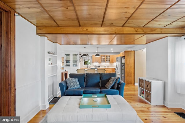 522 Creek Rd, Moorestown, NJ 08057 - living area with light wood-style floors, beamed ceiling, baseboards, and wooden ceiling