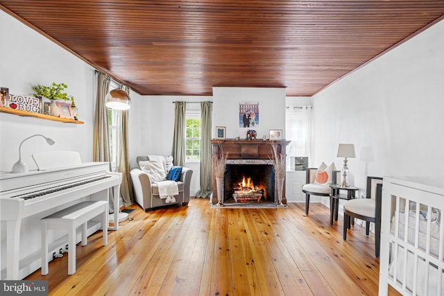 522 Creek Rd, Moorestown, NJ 08057 - sitting room with wooden ceiling, a lit fireplace, light wood-style floors, and ornamental molding